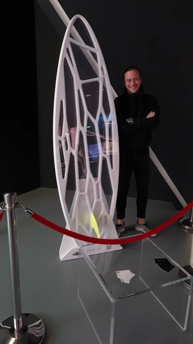 Igor with the Tidal Wave surfboard at Expo 2020 Serbian Pavilion